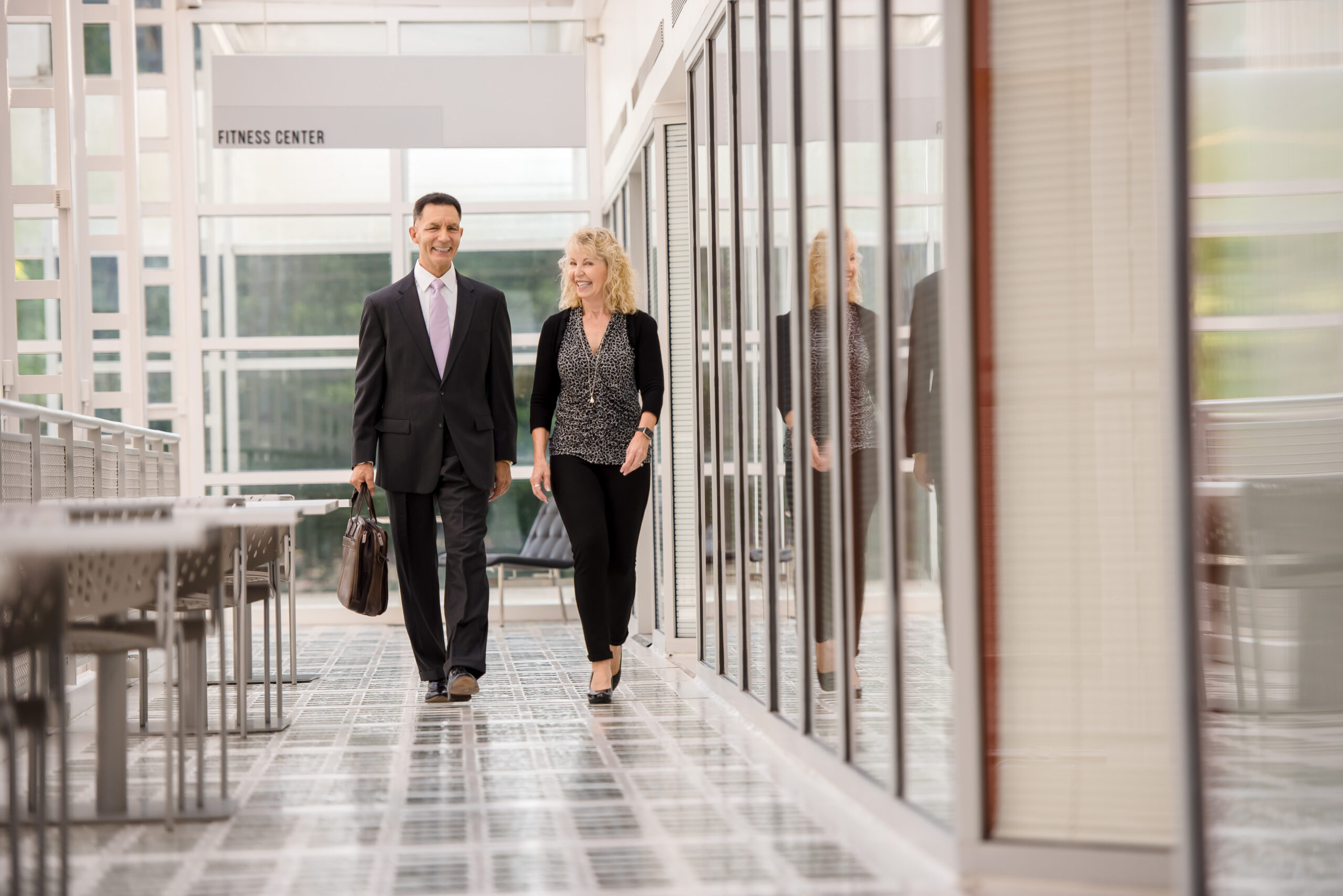 Mingo & Yankala, S.C. attorneys walking in Milwaukee office — boutique personal injury law firm representing accident victims throughout Wisconsin